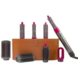 Dyson multi-styler set in gray with fuchsia accents and tan case